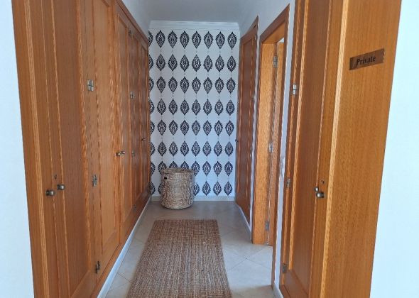 165 varandas do lago master bedroom walk through wardrobe